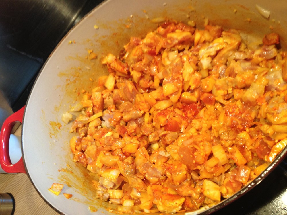 Chicken and Onion with freshly added Sazon Goya and garlic.